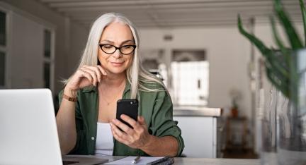 Woman setting up bank account alerts to her account